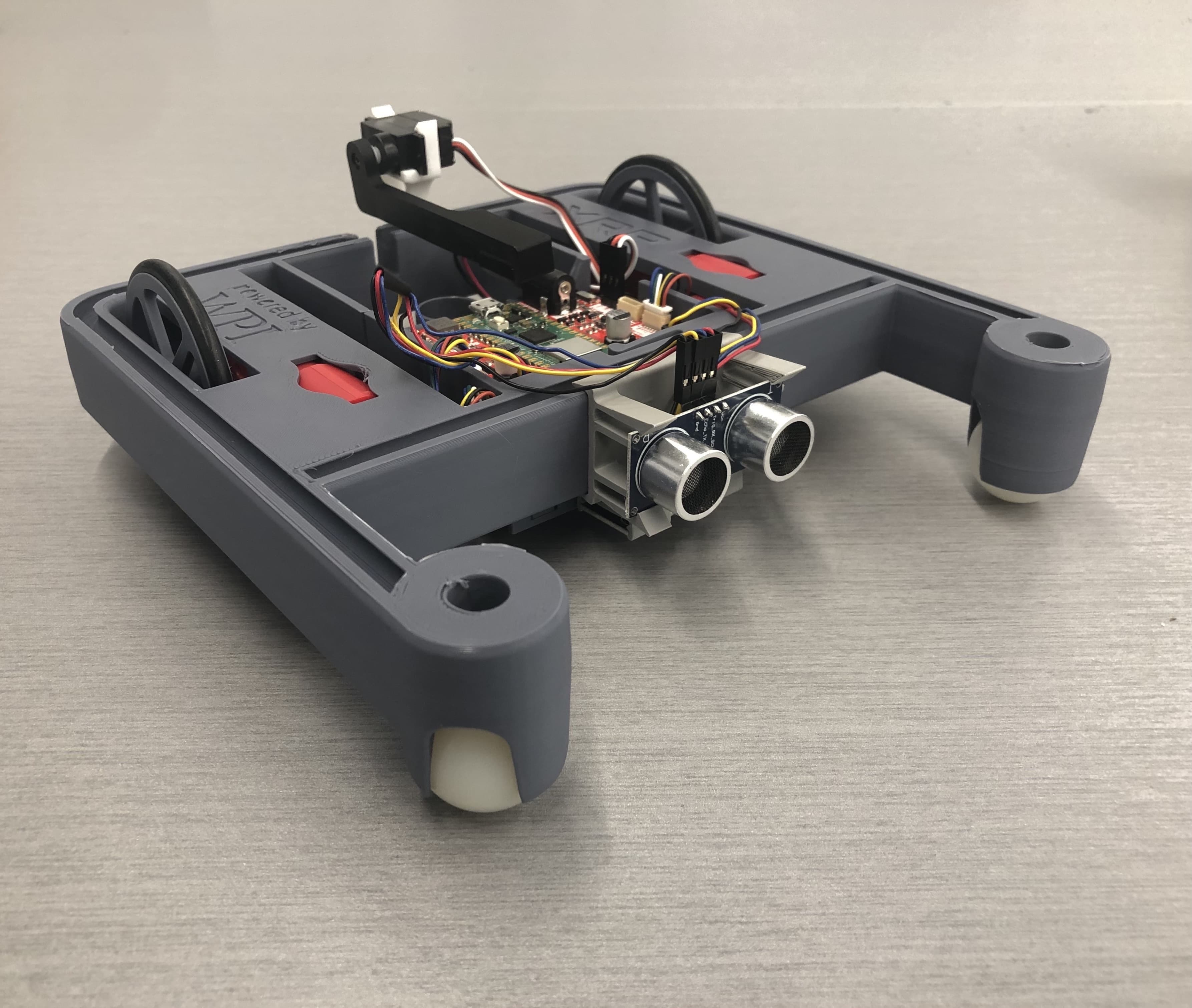 XRP educational robot with wheels, ultrasonic sensors, and a servo motor
